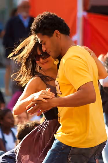 Merengue (dance) — A couple dance to the band Merengada at London's South Bank.