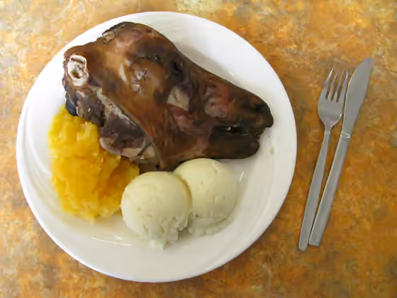 Svið — Svið : a sheep's head, sawed in half, singed and then cooked (with the brain removed), served with mashed swede and mashed potatoes (the balls).