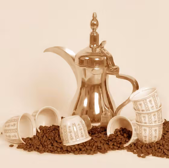 Eastern Arabian cuisine — A dallah a traditional Arab coffee pot with cups and coffee beans