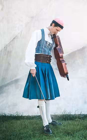 Bäckadräkten — Fredy Clue (stage name of Fredy Samuel Lundh) wearing the Bäckadräkten, Sweden's first unisex folk costume