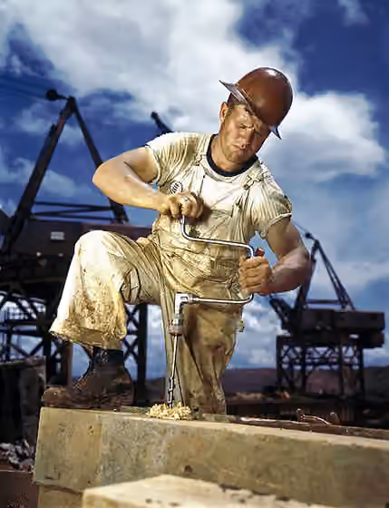 Carpentry — 1942 photograph of carpenter at work on Douglas Dam , Tennessee (built by the Tennessee Valley Authority).