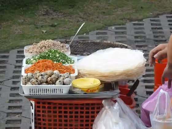 Bánh tráng nướng — A food stall selling bánh tráng nướng - a popular street food in Vietnam.