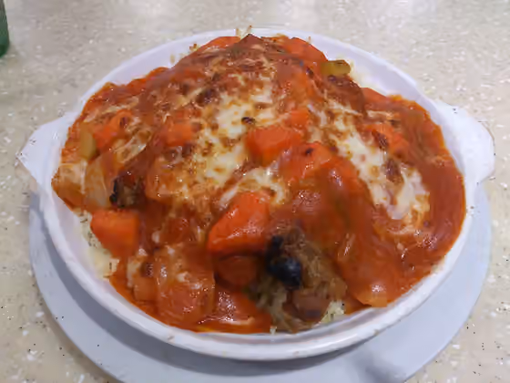 Baked pork chop rice — Baked Pork Chop Rice in Tomato Sauce with Cheese