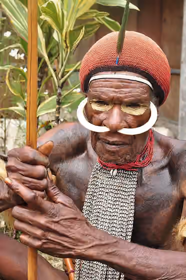 orang Dani — Dani people tribesman with face ornament.