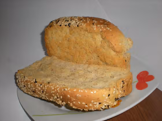 Masakan Bizantium — Two slices of bread baked until they are hard and crisp on a small plate.
