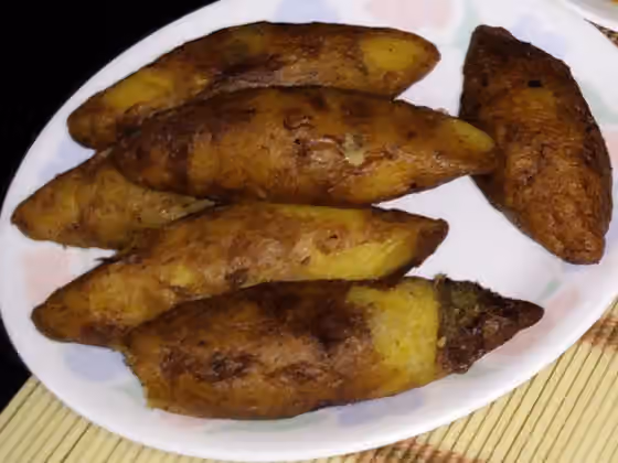 Unnakai — Unnakai (ഉന്നക്കായ്‌) also called Unnakaya, Kai Ada, Unnakka, and Kai Porichathu, is a spindle shaped sweet dessert made chiefly of plantain.