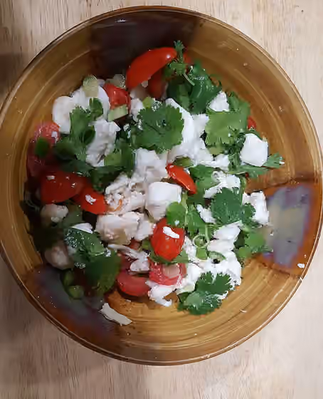 Pacific Northwest cuisine — Ceviche made with Pacific Halibut, serrano peppers, cilantro and tomato