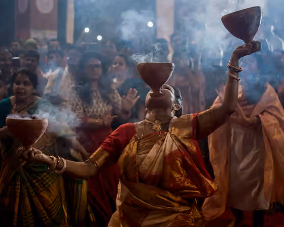 Dhunuchi Nritya — Dhunachi is a Bengali incense burner used for one of the stages during aarti, or ritualized dance worship.