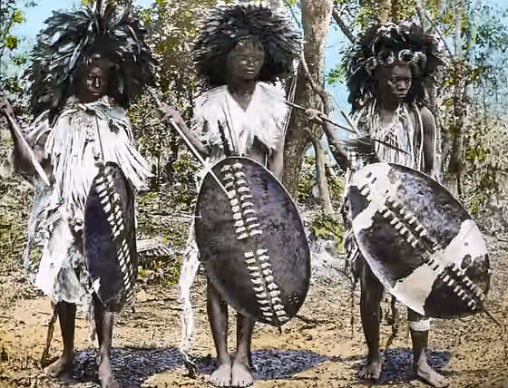 Nguni peoples — "Young Ngoni Warriors, Livingstonia" Malawi, ca.1895 Photograph of three young Ngoni warriors, dressed in traditional tribal dress, including head dress.
