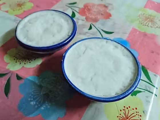 Khanom thuai — A pair of khanom thuai talai , a Thai sweet/dessert