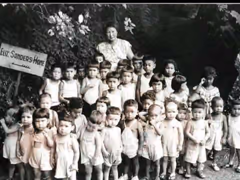 GI Baby — Miki Sawada with orphaned children at Elizabeth Saunders Home, circa 1950.